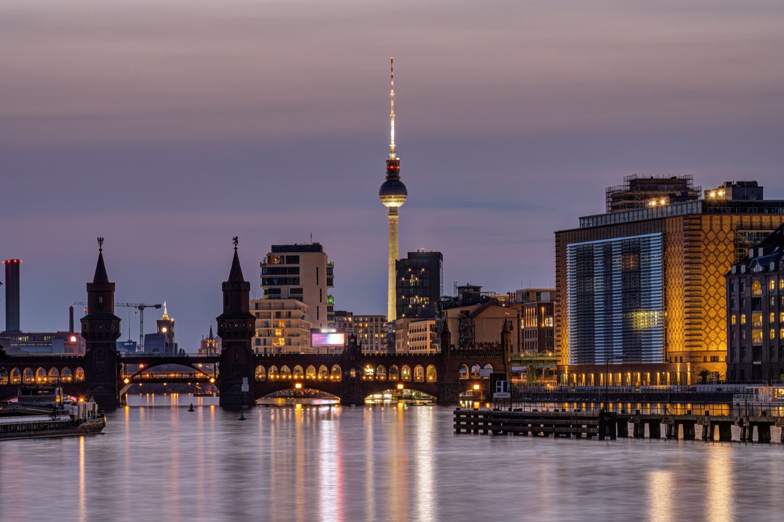 The Spree in Berlin at dusk with the Oberbaum Bridge and the TV Tower